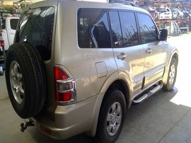 2001 MISTSUBISHI MONTERO, GOLD,, LIMITED MODEL, 3.5L, AT, 4WD.  Z26371
